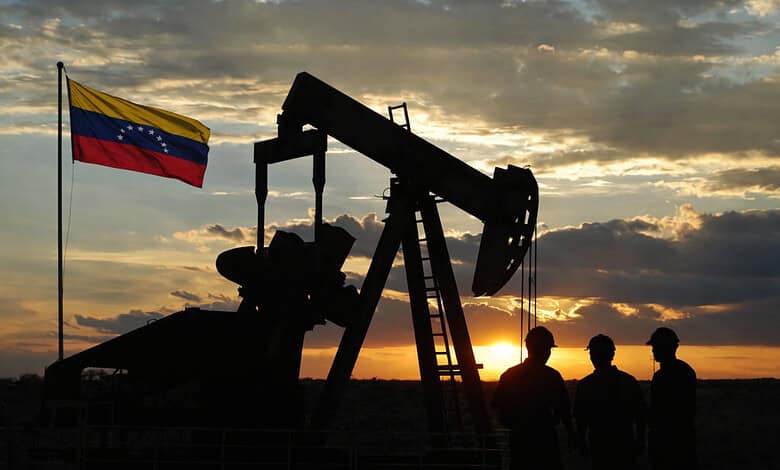Silhouette of an oil pumpjack and workers at sunset beside the Venezuelan flag, symbolising the country's vast energy reserves. Third-party editorial image.