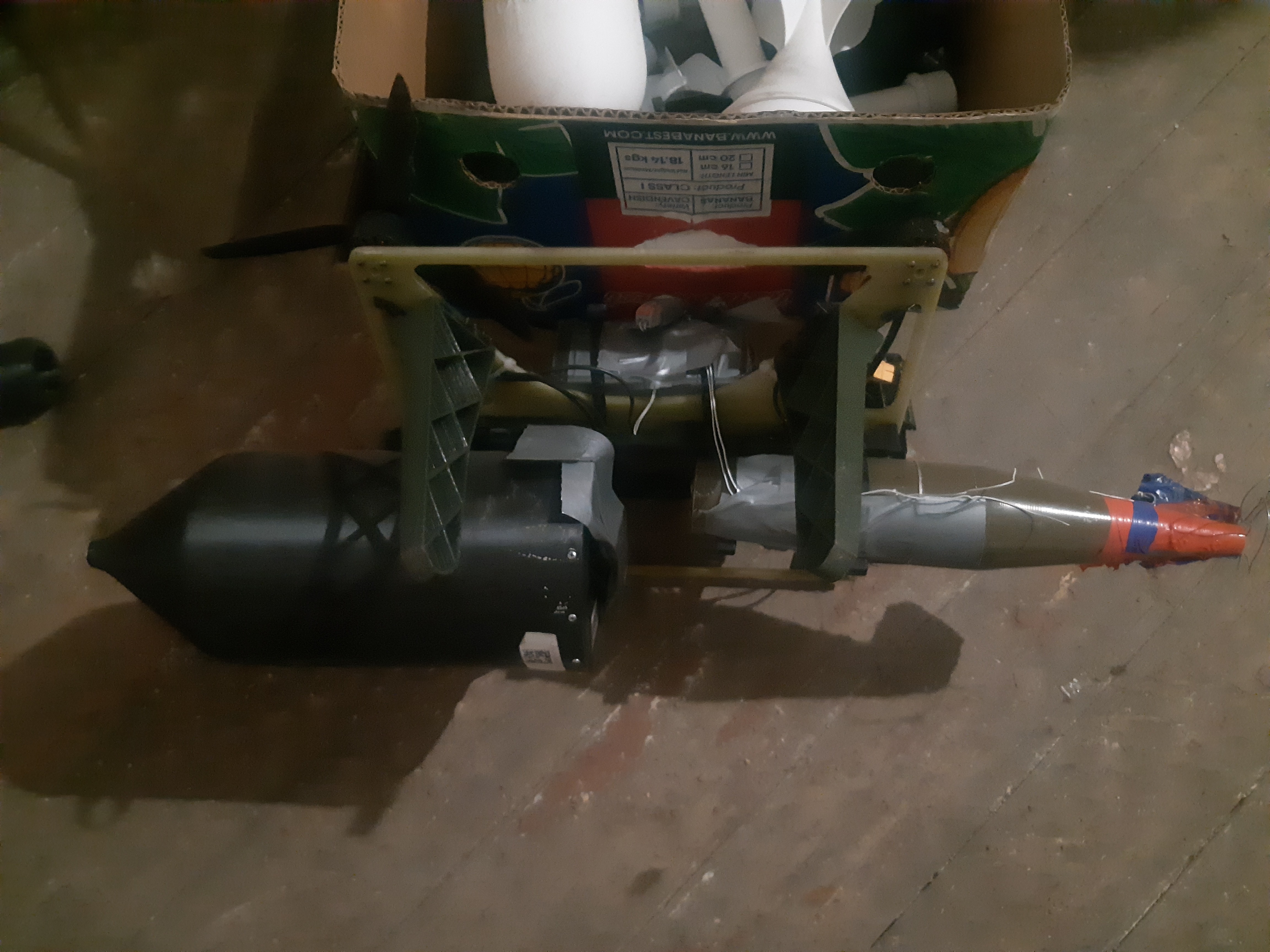 Drone-dropped munitions on a workshop floor, Ukraine