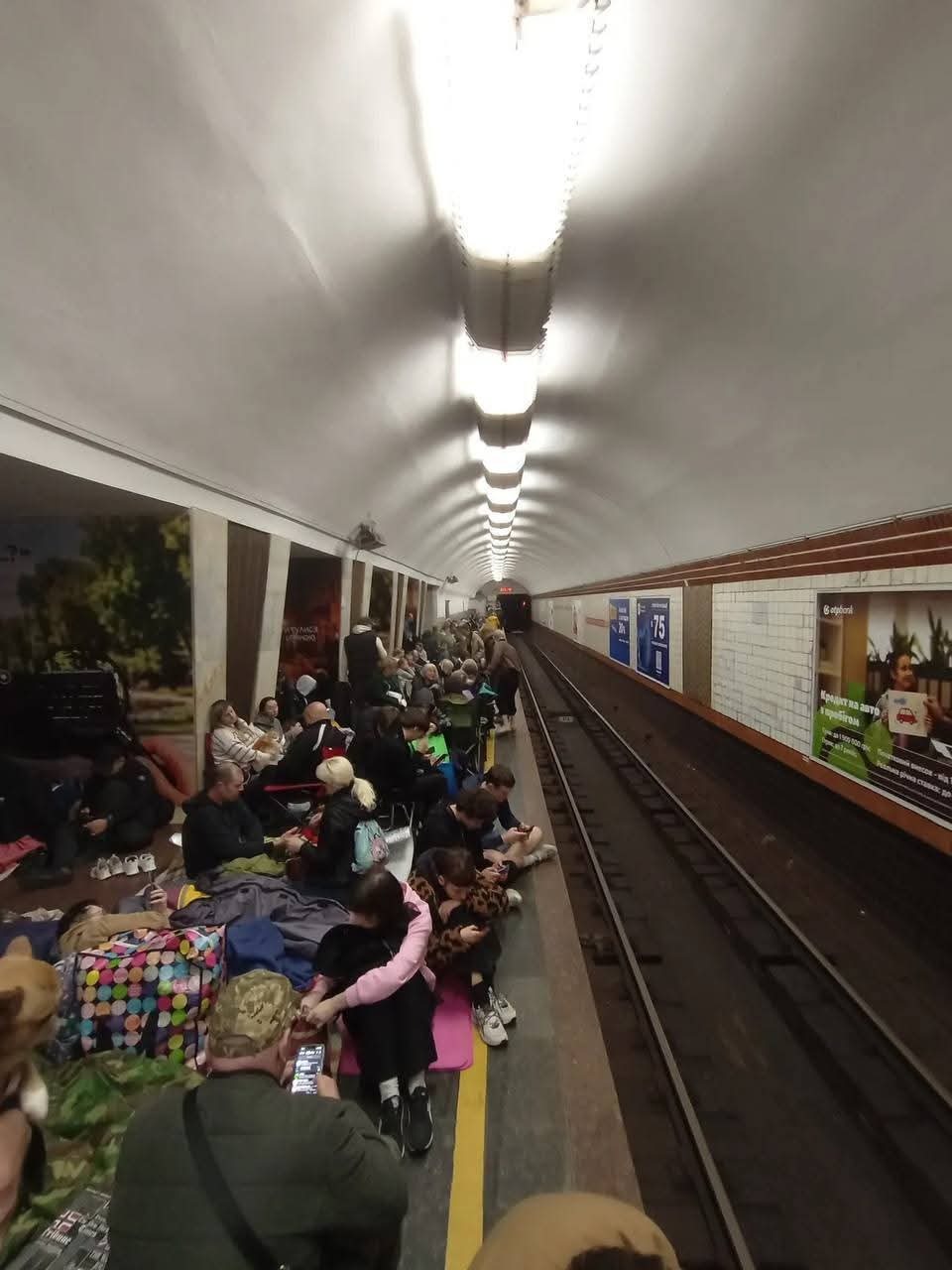 People sheltering in a Kyiv metro station during an air raid
